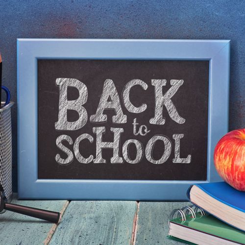 the words 'back to school' on a blackboard